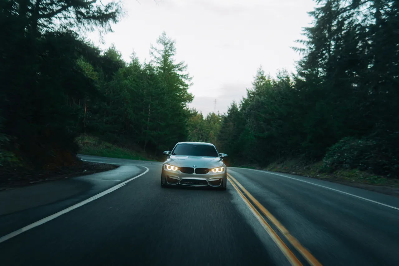 BMW M4 photographed at Tacoma Narrows Bridge, Washington, 2026-03-10.