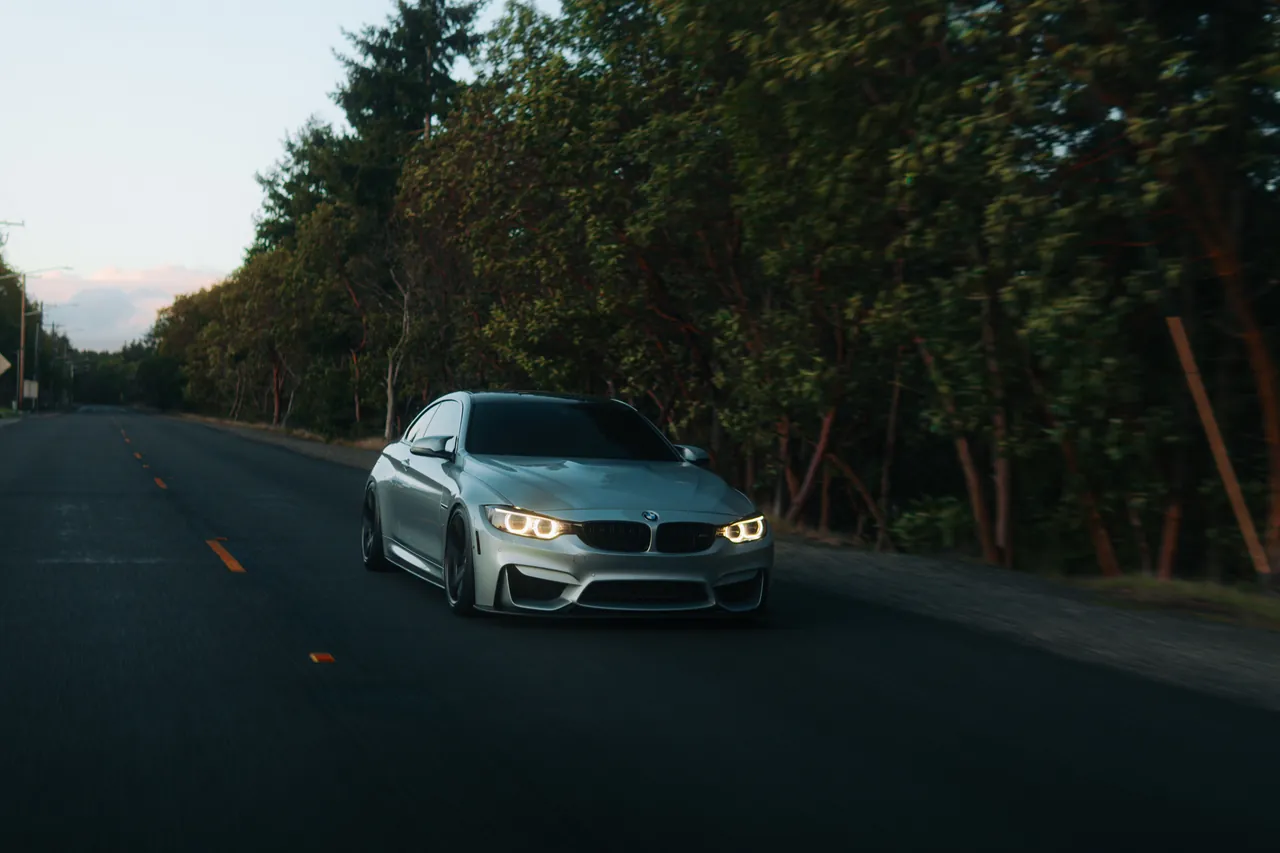 BMW M4 photographed at Tacoma Narrows Bridge, Washington, 2026-03-10.
