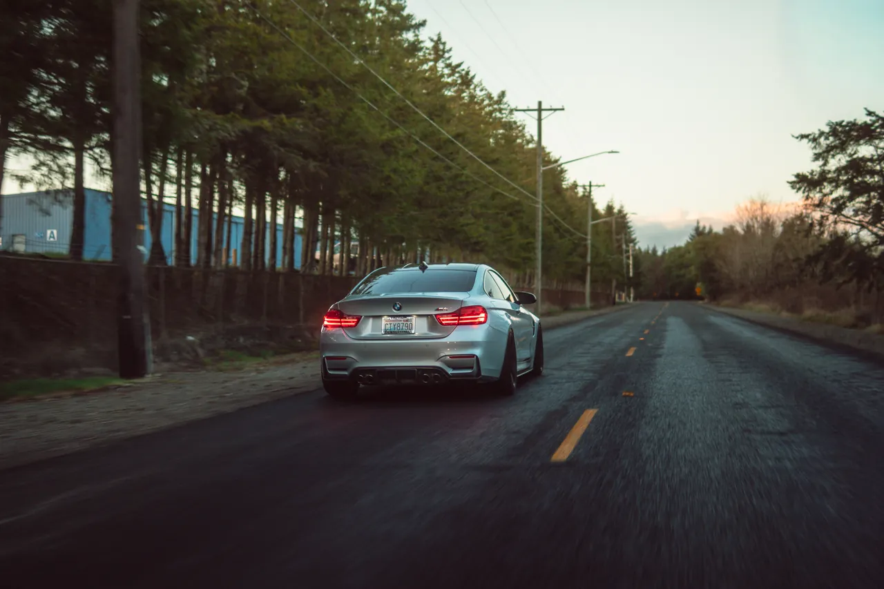 BMW M4 photographed at Tacoma Narrows Bridge, Washington, 2026-03-10.